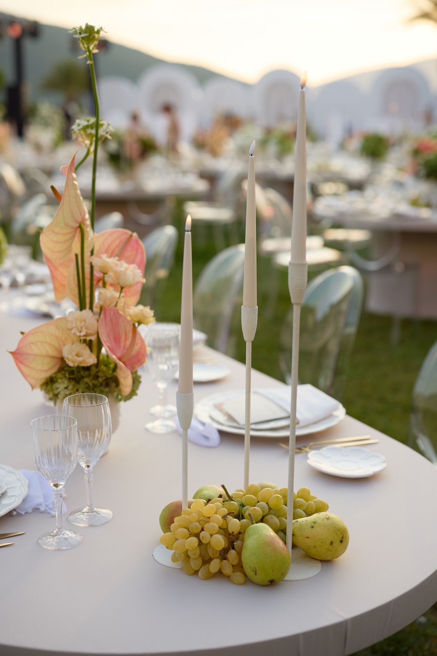 White tall metal candlestick