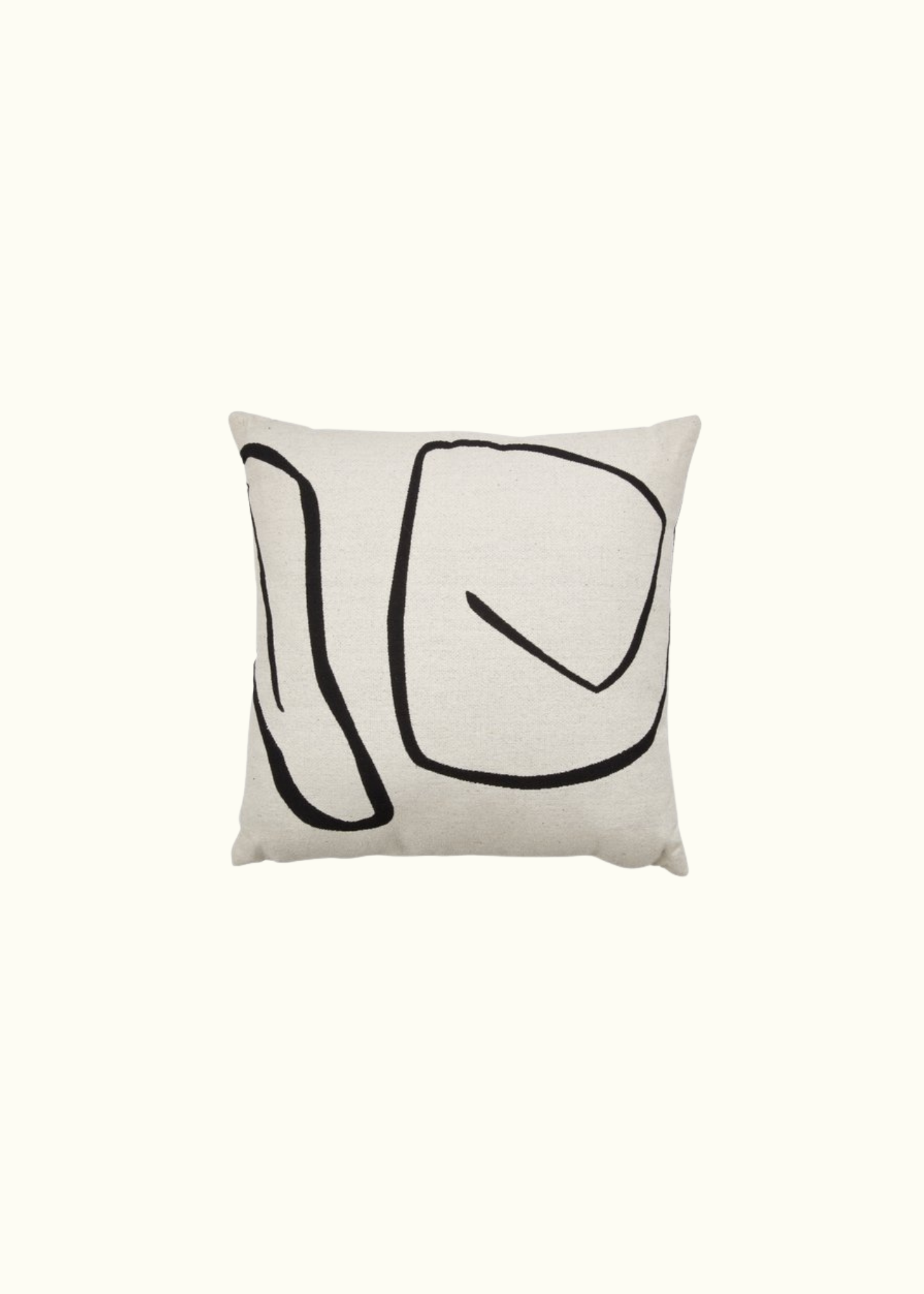 White pillow with black pattern